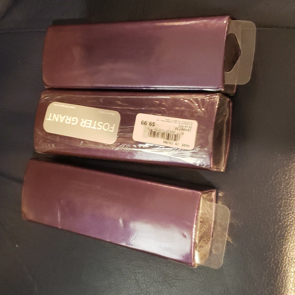 Foster Grant purple eyeglass case.